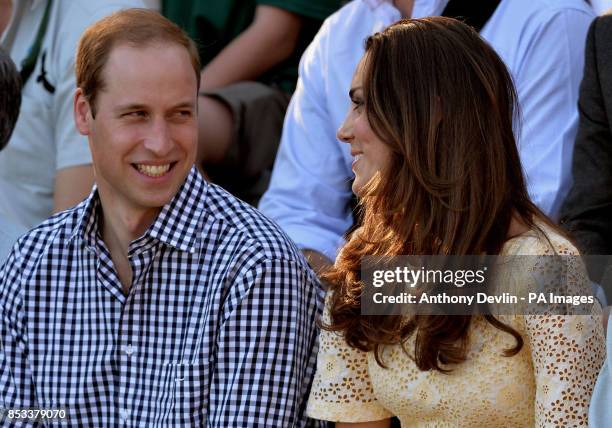 The Duke and Duchess of Cambridge watch Ripley the Barking Owl during a visit to Taronga zoo Sydney during the fourteenth day of their official tour...