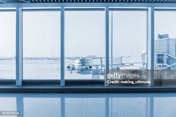 airport window - airport empty gate stock pictures, royalty-free photos & images