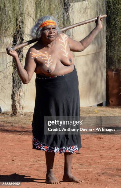 Local woman awaits the arrival of the Duke and Duchess of Cambridge as they plan to visit the National Indigenous Training Academy in Uluru during...