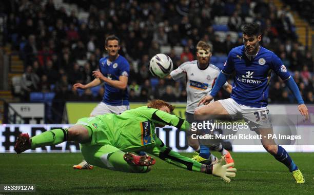 Leicester City's David Nugent is stopped from scoring by Bolton Wanderers goalkeeper Adam Bogdan, during the Sky Bet Championship match at the Reebok...