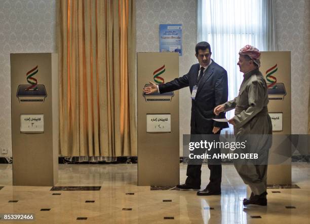 Iraqi Kurdish leader Massud Barzani prepares to cast his vote in the Kurdish independence referendum at a polling station near Arbil, the capital of...