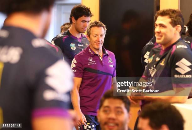 Coach Craig Bellamy arrives for the team photo during a Melbourne Storm NRL training session at Gosch's Paddock on September 25, 2017 in Melbourne,...