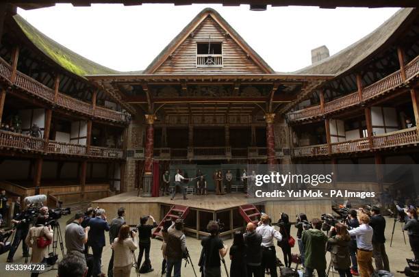 Actors on stage performing a scene from the play, at the launch of Shakespeare's Globe Theatre's two-year world tour of Hamlet, to mark the 450th...