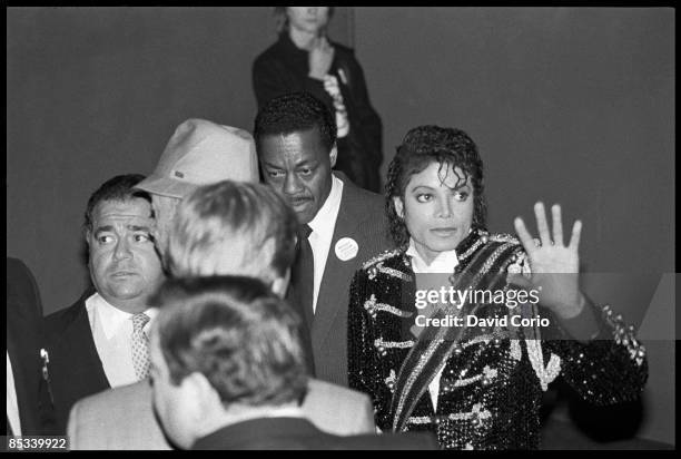 Michael Jackson arriving at Madame Tussauds Wax Museum on Baker Street for the unveiling of his waxwork with manager Frank DiLeo on left.