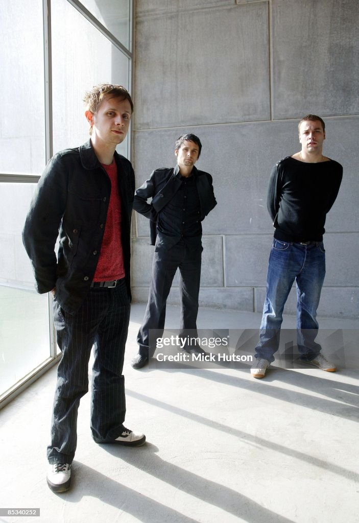 Photo of Chris WOLSTENHOLME and MUSE and Dominic HOWARD and Matt BELLAMY