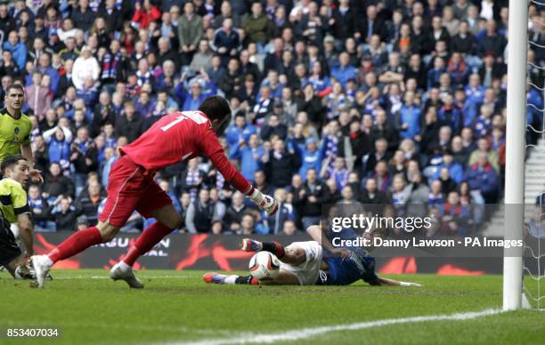 Rangers' Dean Shiels scores his sides third goal during the Scottish League One match at Ibrox Stadium, Glasgow.