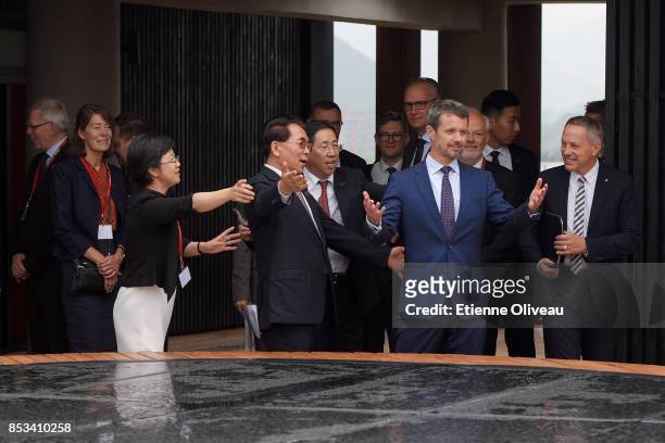 Crown Prince Frederik of Denmark , President of Chinese Academy of Science, Bai Chunli and The Ambassador of Denmark, A. Carsten Damsgaard tour the...