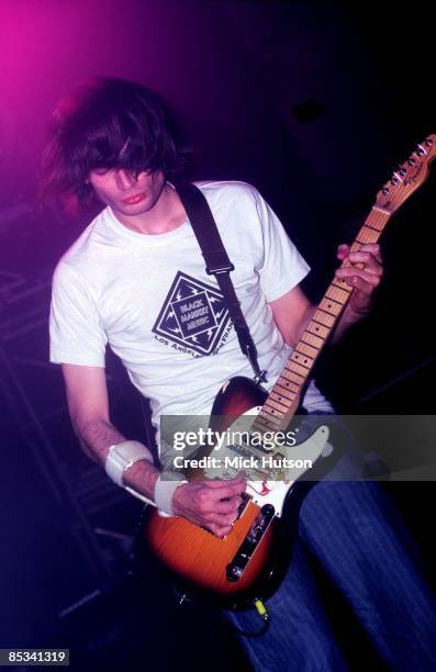 Photo of RADIOHEAD and Jonny GREENWOOD; Jonny Greenwood performing live onstage, playing Fender Telecaster, wearing arm brace