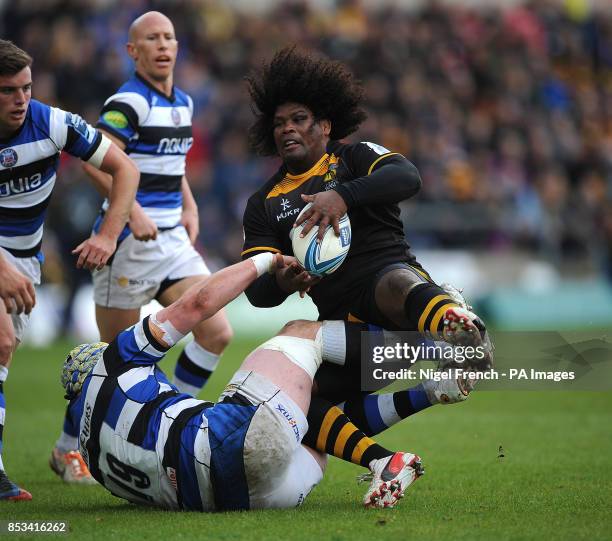 Wasps Ashley Johnson is tackled by Bath's Carl Fearns during the Amlin Challenge Cup Semi Final match at Adams Park, High Wycombe.