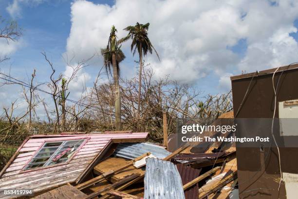 Wooden house lays on ground.The mountain town of Juncos is one of the most affected after the pass of Hurricane María. Hurricane Maria passed through...
