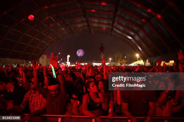 Festivalgoers watch DJ Tchami perform on Fremont Stage during day 3 of the 2017 Life Is Beautiful Festival on September 24, 2017 in Las Vegas, Nevada.
