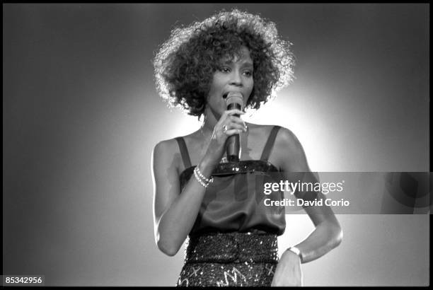 Photo of Whitney HOUSTON, Whitney Houston performing on stage