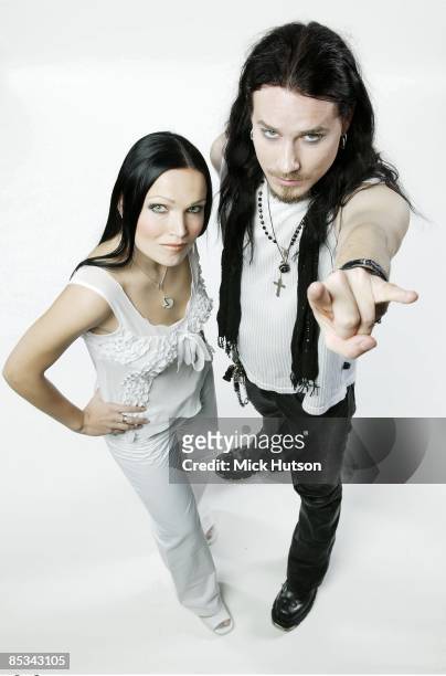 Photo of NIGHTWISH and Tarja TURUNEN and Tuomas HOLOPAINEN; L-R: Tarja Turunen, Tuomas Holopainen - posed, studio
