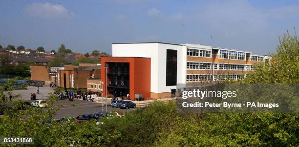 An exterior of Corpus Christi Catholic College in Leeds, after much loved teacher Ann Maguire was stabbed to death yesterday in front of her pupils.