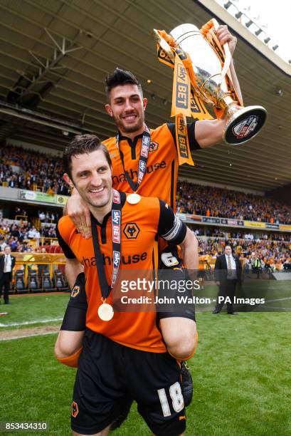 Wolverhampton Wanderers' Sam Ricketts and Danny Batth, (holding trophy celebrate during the Sky Bet League One match at Molineux, Wolverhampton.