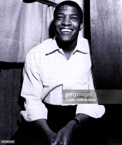 Photo of Clyde McPHATTER; posed, backstage