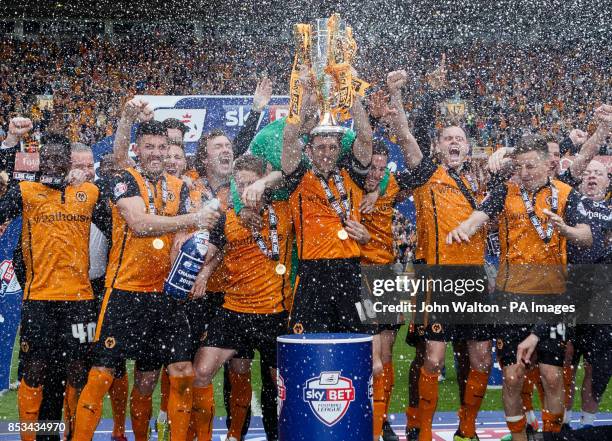 Wolverhampton Wanderers' captain Sam Ricketts lifts the trophy during the Sky Bet League One match at Molineux, Wolverhampton.