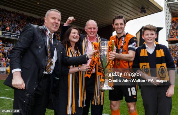 Wolverhampton Wanderers' owner Steve Morgan celebrates alongside manager Kenny Jackett and captain Sam Ricketts after the Sky Bet League One match at...