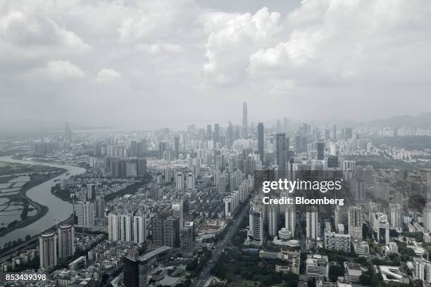 Commercial and residential buildings are seen from the observation deck of the KK100 tower in Shenzhen, China, on Wednesday, Sept. 20, 2017. China is...