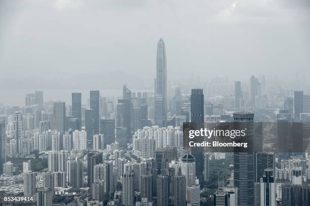 The Ping An International Finance Center , center, stands among commercial and residential buildings in Shenzhen, China, on Wednesday, Sept. 20,...