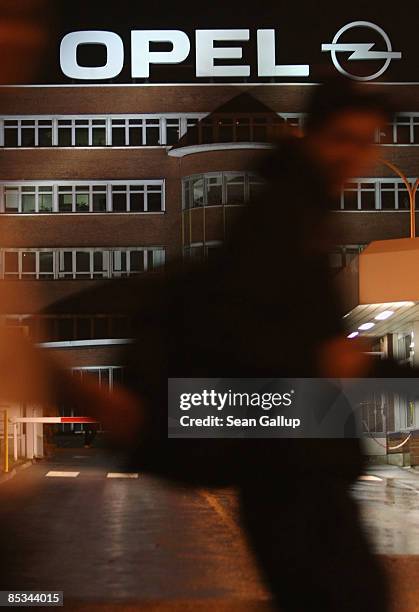 Workers come and go at the Opel Werk I factory of German automaker Opel at the conclusion of the day shift on March 10, 2009 in Bochum, Germany....