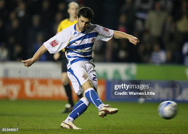 Shane Long of Reading converts a penalty after he was fouled in the box during the Coca-Cola Championship match between Reading and Charlton Athletic...