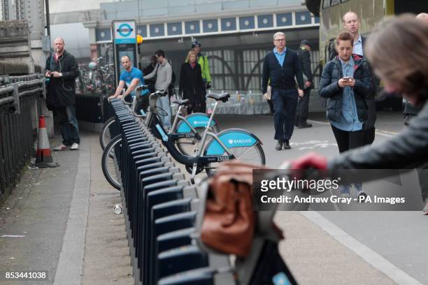 Commuters use Barclays Cycle Hire bikes outside Waterloo station, London, on the second day of a 48 hour strike by tube workers on the London...