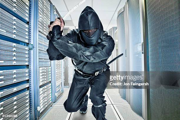 ninja guarding server room - ninja weapon stock pictures, royalty-free photos & images