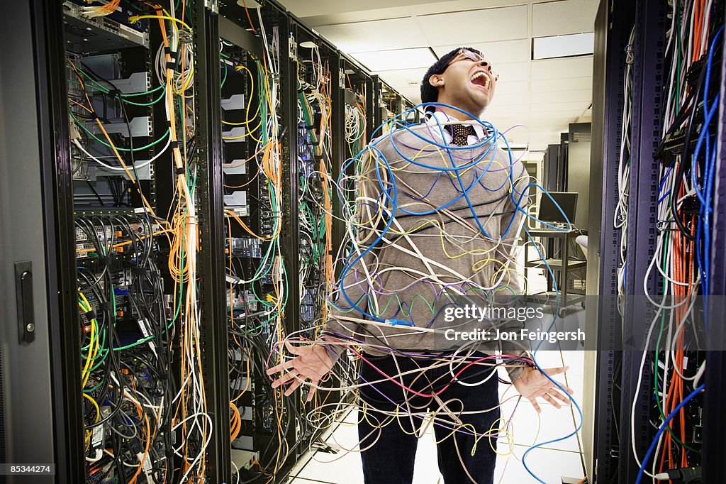 Server room technician tangled and frustrated