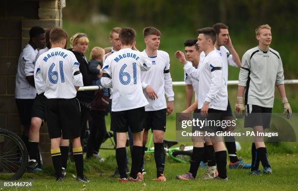 Former pupils of Corpus Christi Roman Catholic College during a memorial football match for teacher Ann Maguire who was stabbed to death by a pupil...