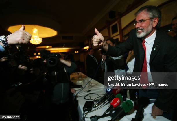 Sinn Fein president Gerry Adams receives a thumbs up after a press conference at the Balmoral Hotel, Belfast, after his release from custody at...