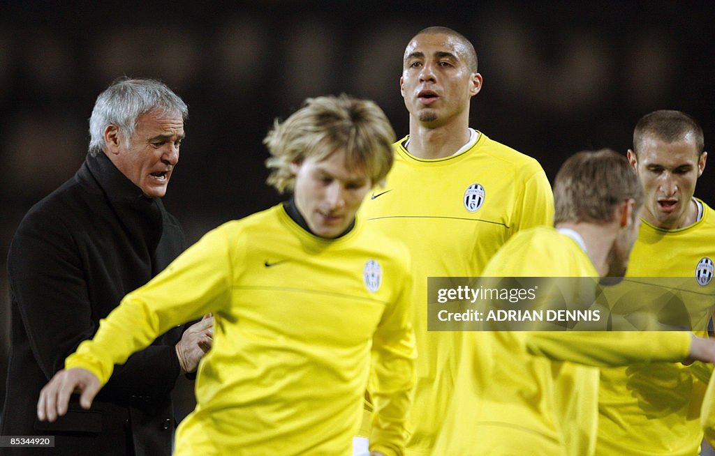 Juventus coach Claudio Ranieri (L) watch
