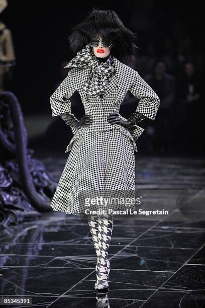 Model walks down the catwalk during the Alexander McQueen Ready-to-Wear A/W 2009 fashion show during Paris Fashion Week at POPB on March 10, 2009 in...