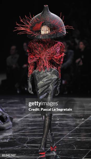 Model walks down the catwalk during the Alexander McQueen Ready-to-Wear A/W 2009 fashion show during Paris Fashion Week at POPB on March 10, 2009 in...