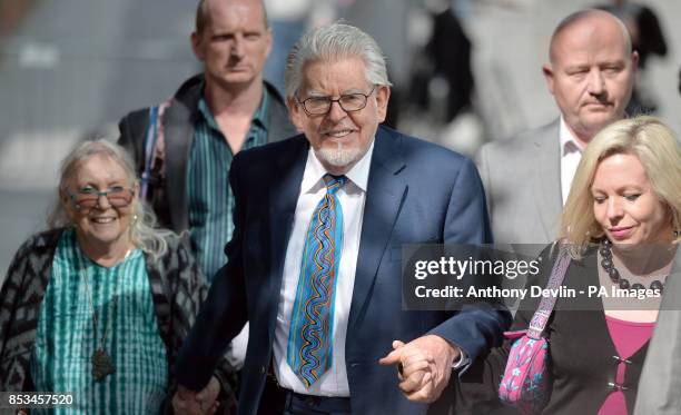 Rolf Harris leaves Southwark Crown Court with his wife Alwen , following jury selection after the 84-year-old pleaded not guilty to 12 charges dating...