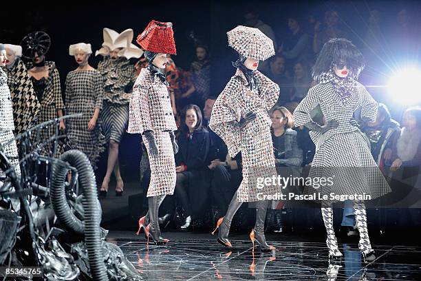 Models walk down the catwalk during the Alexander McQueen Ready-to-Wear A/W 2009 fashion show during Paris Fashion Week at POPB on March 10, 2009 in...