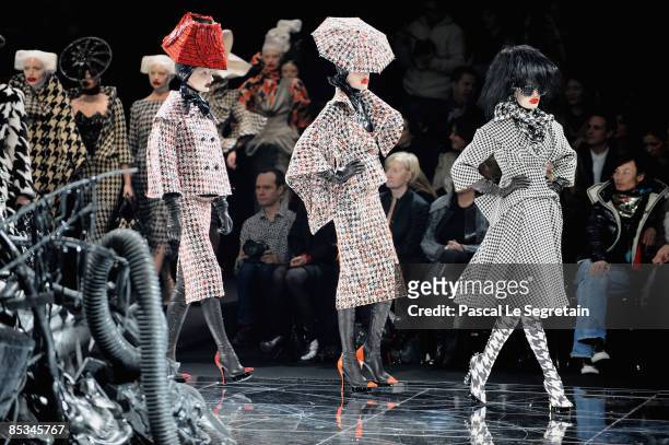 Models walk down the catwalk during the Alexander McQueen Ready-to-Wear A/W 2009 fashion show during Paris Fashion Week at POPB on March 10, 2009 in...