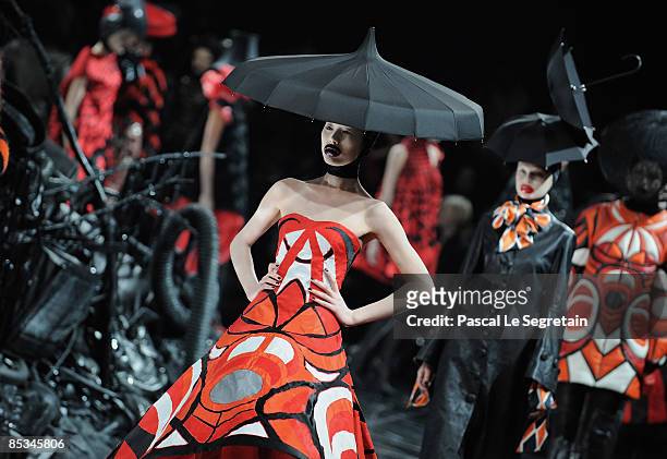 Models walk down the catwalk during the Alexander McQueen Ready-to-Wear A/W 2009 fashion show during Paris Fashion Week at POPB on March 10, 2009 in...