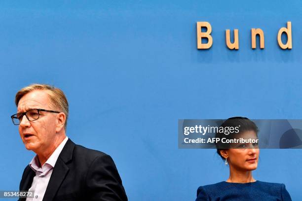 Top candidate of Die Linke party Sahra Wagenknecht and Dietmar Bartsch are seen prior a press conference in Berlin on September 25 one day after...