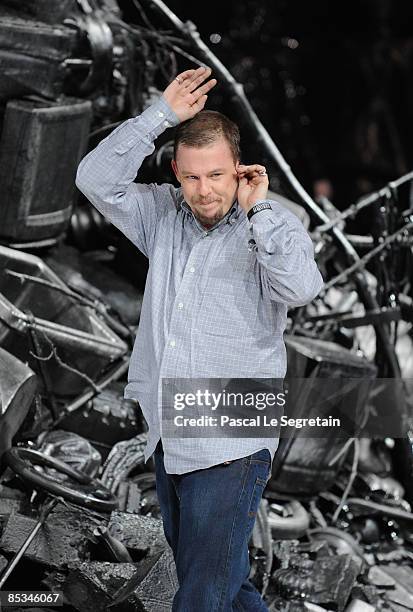 Fashion designer Alexander McQueen walks down the catwalk after his Ready-to-Wear A/W 2009 fashion show during Paris Fashion Week at POPB on March...