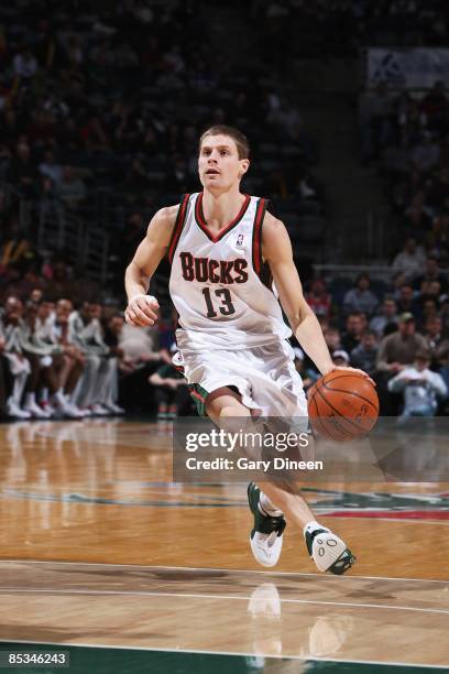 Luke Ridnour of the Milwaukee Bucks moves the ball against the Denver Nuggets during the game on February 22, 2009 at the Bradley Center in...