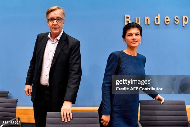 Top candidate of Die Linke party Sahra Wagenknecht and Dietmar Bartsch arrive at a press conference in Berlin on September 25 one day after general...