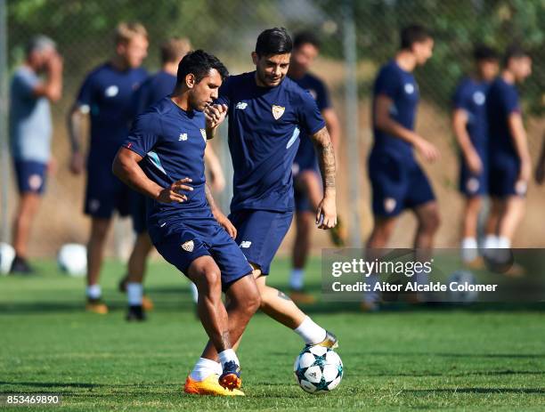 Walter Montoya of Sevilla FC being followed by Ever Banega of Sevilla FC during the training session prior to their UEFA Champions League match...