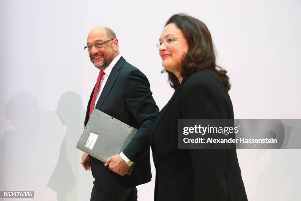 German Social Democrat Martin Schulz, who had run for chancellor in yesterday's federal elections, arrives with Minister of Work and Social Issues...