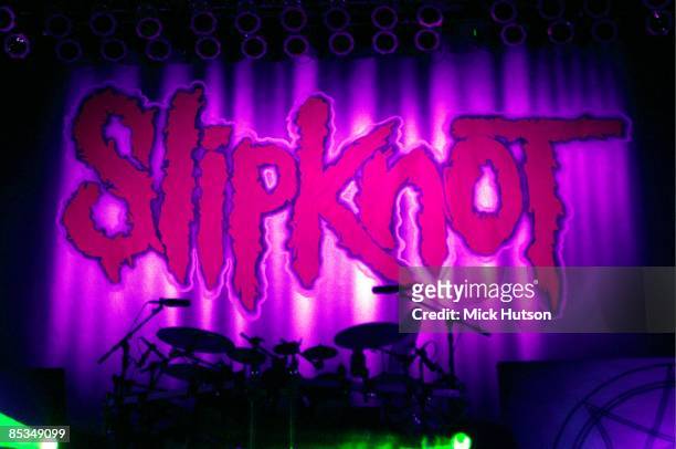 Photo of SLIPKNOT; Slipkot logo on stage