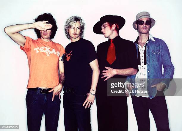 Photo of Robert DELEO and STONE TEMPLE PILOTS and Dean DELEO and Eric KRETZ and Scott WEILAND; L-R: Dean DeLeo, Eric Kretz, Scott Weiland, Robert...