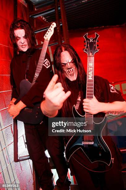 Photo of Mick THOMSON and Jim ROOT and SLIPKNOT; Posed portrait of Jim Root and Mick Thomson