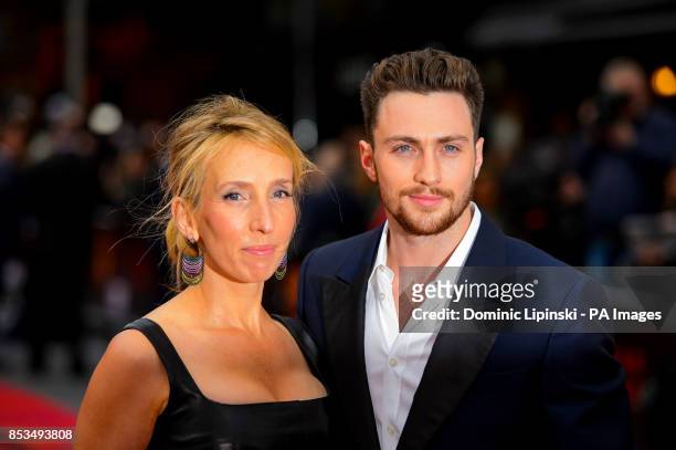 Sam Taylor-Wood and Aaron Taylor-Johnson arriving at the European premiere of Godzilla, at the Odeon Leicester Square, central London.