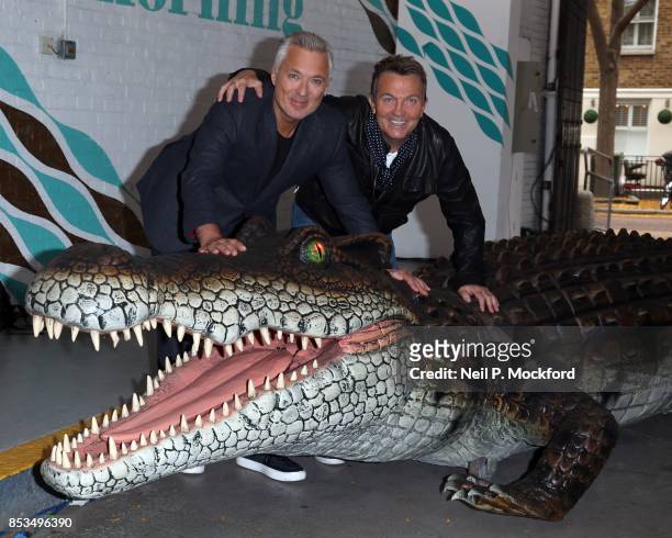 Martin Kemp and Bradley Walsh with an animatronic crocodile from 'Peter Pan: An Arena Spectacular' at This Morning, ITV Studios on September 25, 2017...