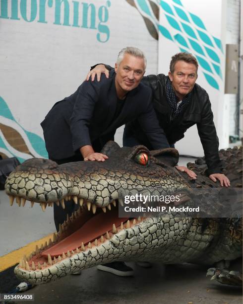 Martin Kemp and Bradley Walsh with an animatronic crocodile from 'Peter Pan: An Arena Spectacular' at This Morning, ITV Studios on September 25, 2017...